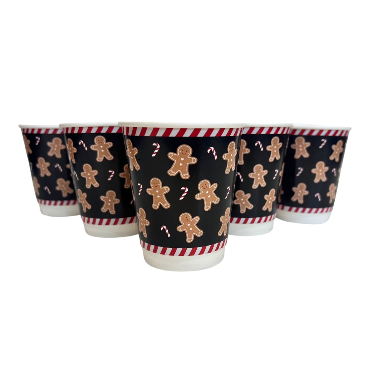 Set of four paper cups with gingerbread man design on a white background