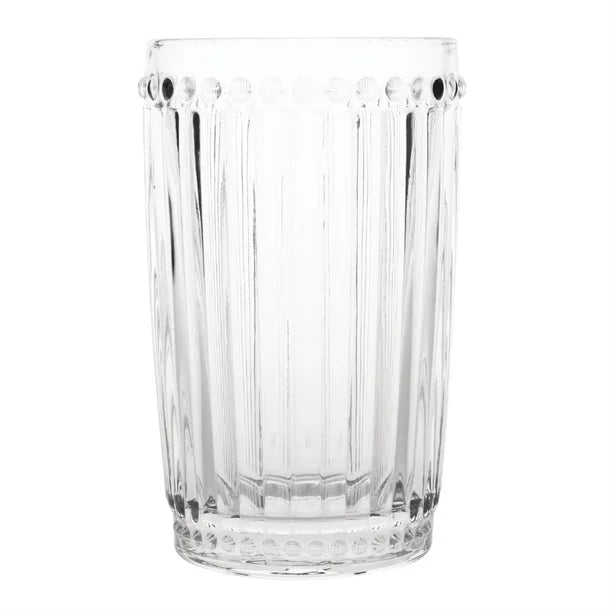 A clear glass tumbler with a geometric cut design.