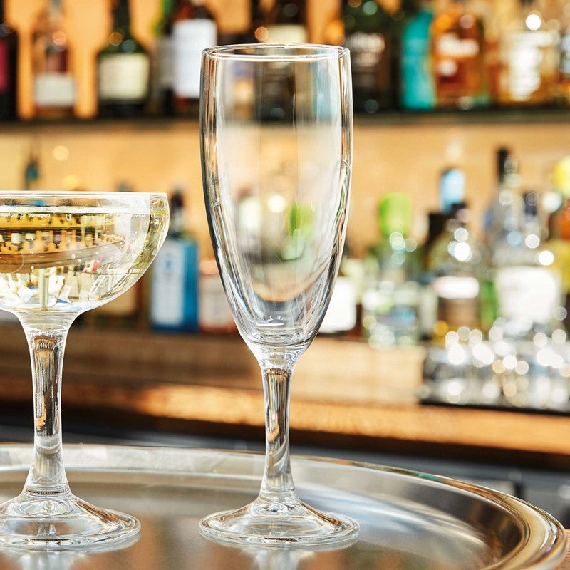 wine glass on a silver tray