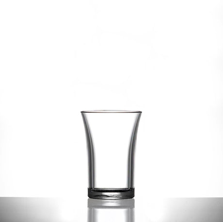 Clear shot glass on a white background