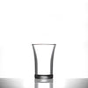 Clear shot glass on a white background