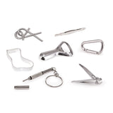 Collection of silver tools and accessories on a white background