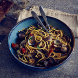 aqua blue terra procelain bowl filled with noodles