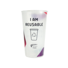 A white reusable plastic pint cup with text and recycling symbol printed on it, indicating its eco-friendliness.
