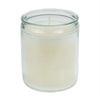 Clear glass candle jar with a white candle inside on a white background