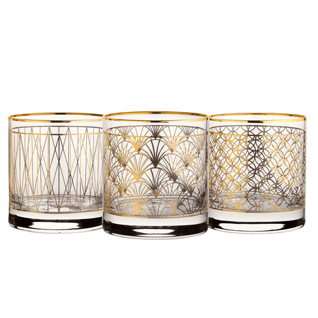 Three decorative glasses with gold geometric patterns on a white background