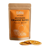 Packaged dehydrated orange slices with Global Garnishes branding on an orange background.