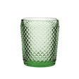 Green textured glass tumbler on a white background
