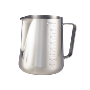 Stainless steel milk frothing pitcher with measurement markings on a white background