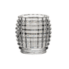 Clear glass candle holder with textured design on a white background