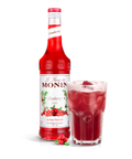 Monin Cranberry Syrup bottle and a fruity drink