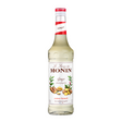 Monin ginger syrup bottle on a white background