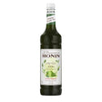 Monin Matcha Green Tea syrup bottle on a white background