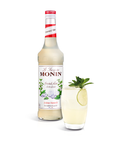 Monin Mint (Frosted) Syrup bottle and a long drink