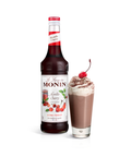 Monin Morello Cherry Syrup bottle and a hot drink