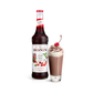Monin Morello Cherry Syrup bottle and a hot drink