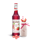 Monin Strawberry Bon Bon Syrup bottle and a milky drink