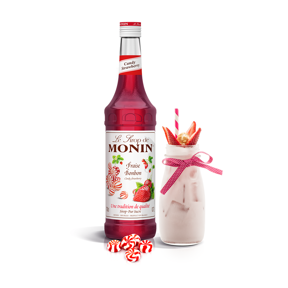 Monin Strawberry Bon Bon Syrup bottle and a milky drink
