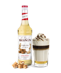 Monin Toffee Nut Syrup bottle and creamy drink