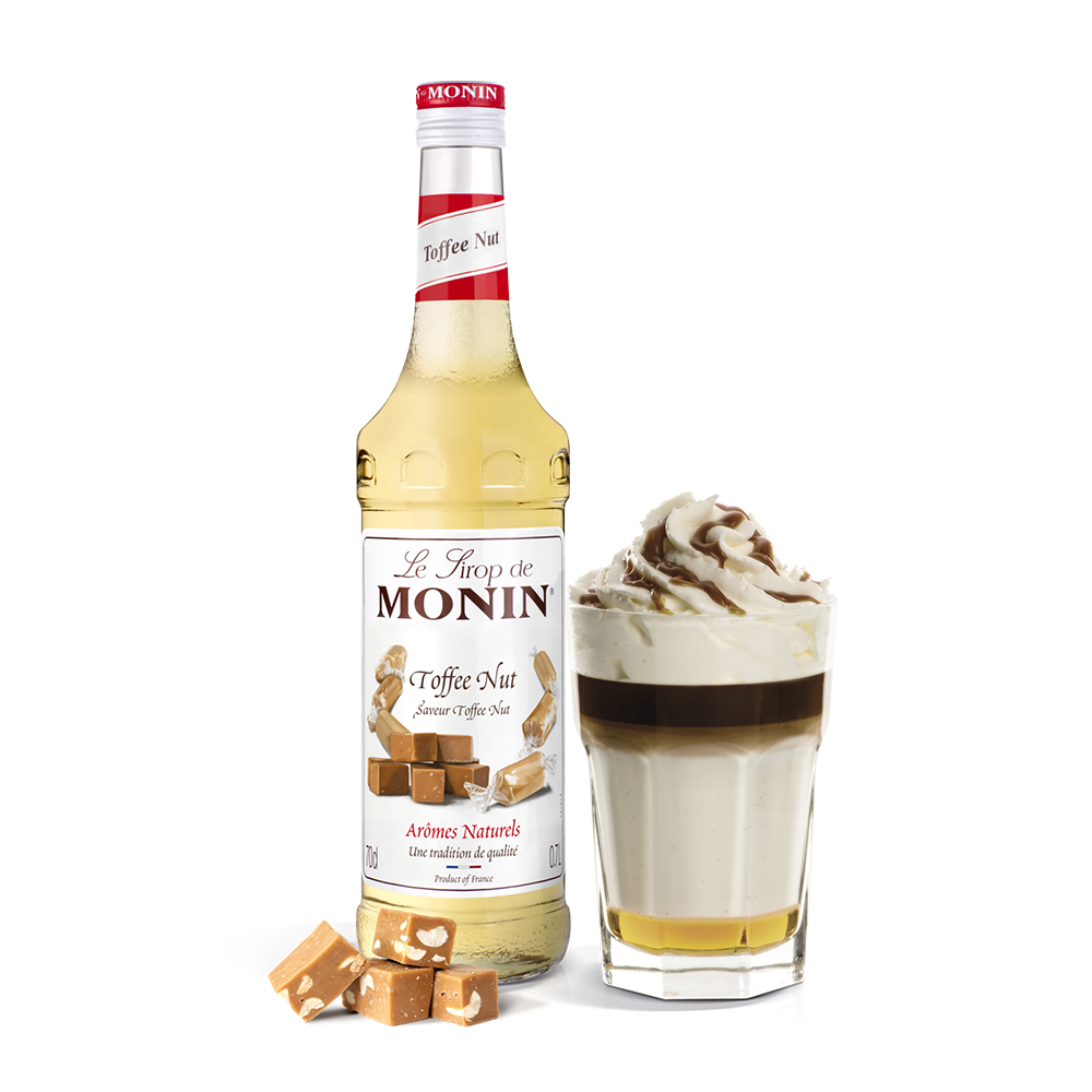 Monin Toffee Nut Syrup bottle and creamy drink