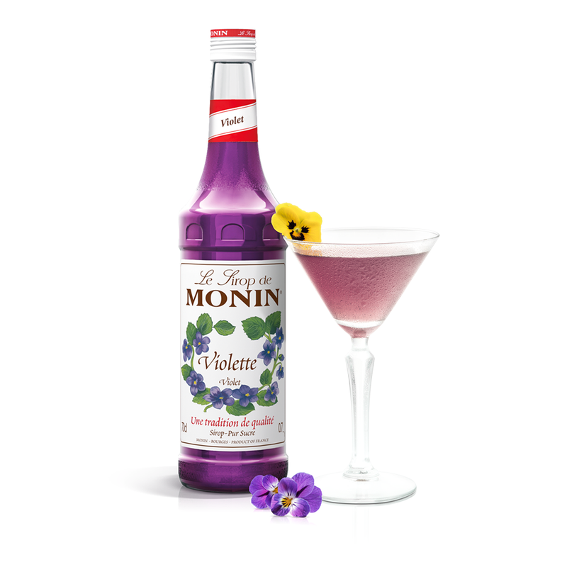 Monin Violet Flavoured Syrup bottle and a cocktail