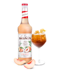 Monin White Peach Syrup bottle and cocktail