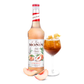 Monin White Peach Syrup bottle and cocktail