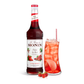 Monin Wild Strawberry Syrup bottle and a strawberry drink