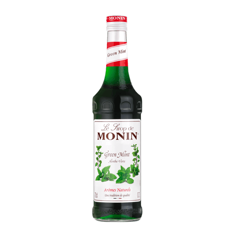 A 700ml glass bottle of Monin Mint (Green) Syrup with a label showing the brand name, product name, and an image of mint leaves.