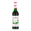 A 700ml glass bottle of Monin Mint (Green) Syrup with a label showing the brand name, product name, and an image of mint leaves.