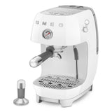White espresso machine with Smeg logo on a white background