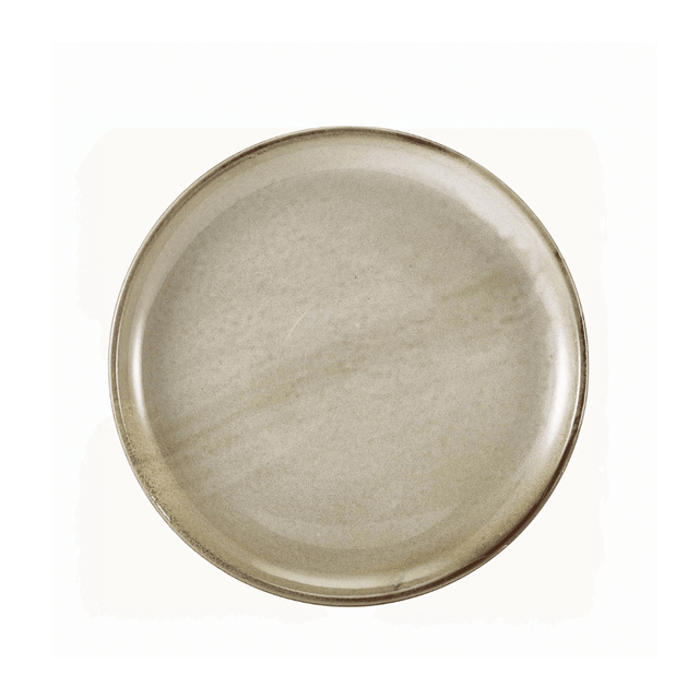 Round ceramic plate with a textured surface on a white background