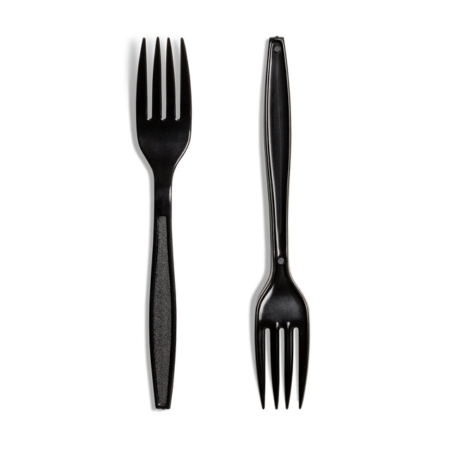 Two black reusable plastic forks laid out on a white background, showcasing their design and color.