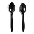 Two black disposable plastic spoons on a white background.