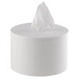 White tissue roll with a tissue peeking out on a white background