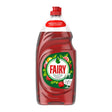 Red bottle of Fairy dishwashing liquid on a white background
