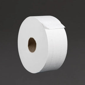 White toilet paper roll on a dark background