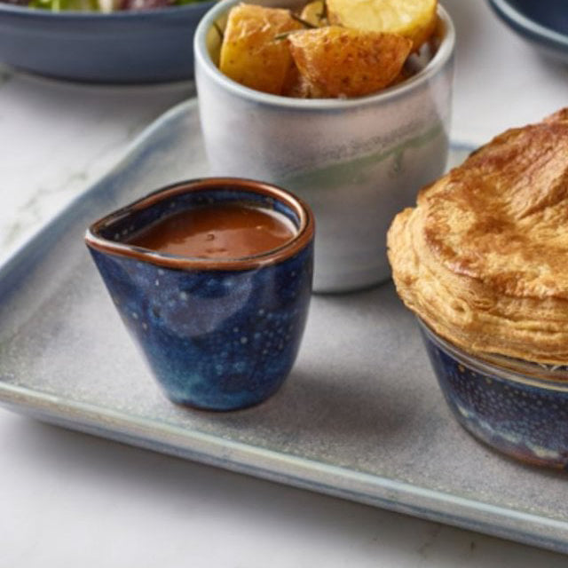 aqua blue terra porcelain jugl filled with gravy