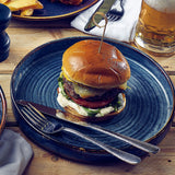 terra porcelain aqua blue round plate with a burger on it