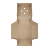 Brown cardboard box with holes on a white background