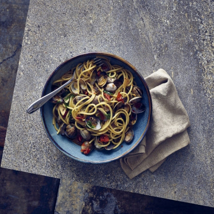 aqua blue terra porcelain bowl filled with noodles 