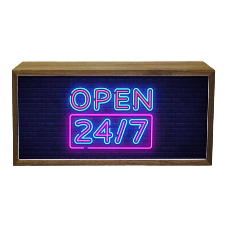 A rectangular LED sign with a wooden frame displaying the text 'OPEN 24/7' in bright neon blue and pink letters.