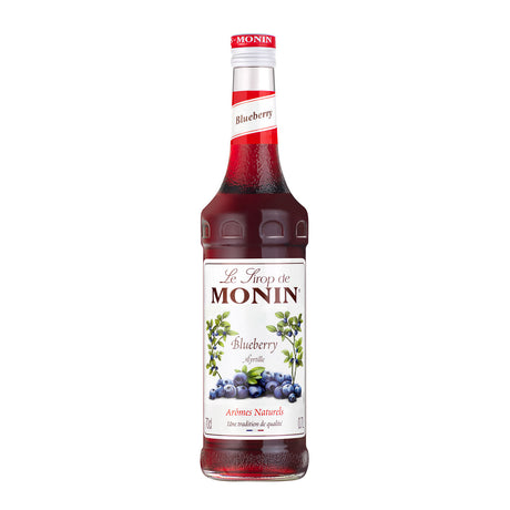 Monin blueberry syrup bottle on a white background
