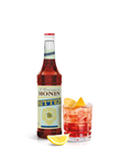 monin bitter syrup bottle and drink