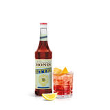 monin bitter syrup bottle and drink