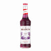 Monin lavender syrup bottle on a white background
