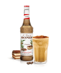 monin tiramisu syrup bottle beside a long drink