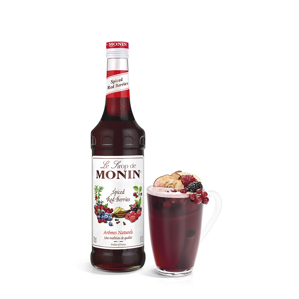 monin spiced red berry syrup bottle and drink