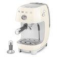 Cream-colored espresso machine with Smeg branding on a white background