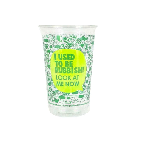 A clear plastic half pint cup with green text and graphics, including the phrase 'I USED TO BE RUBBISH! LOOK AT ME NOW'.